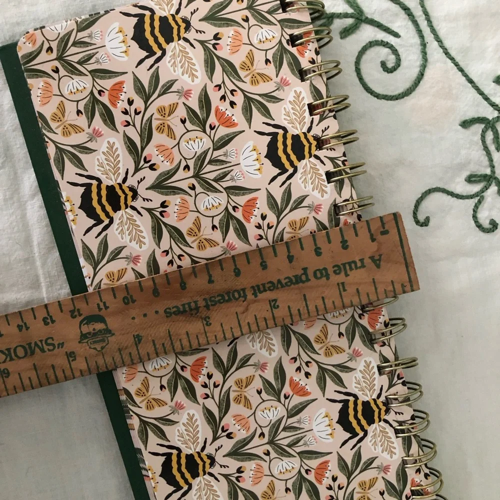 Juliana Tipton x Fringe weekly desktop planner featuring a bee and botanical pat